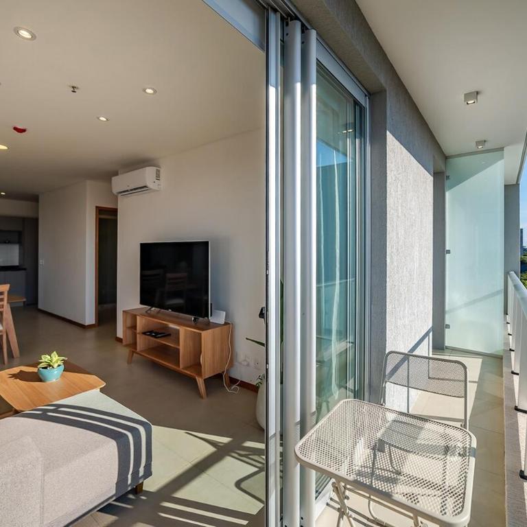 605 Emerald Boutique building just steps away from Shopping del Sol! - Two-Bedroom Apartment - 36