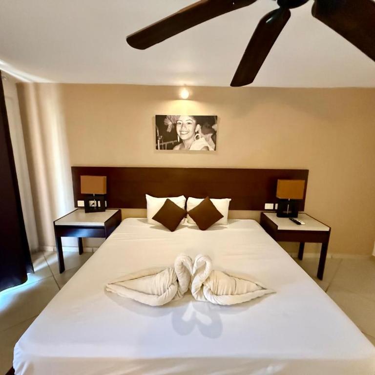 AMANÁA Hotel Boutique - Suite con cama grande y balcón - 24
