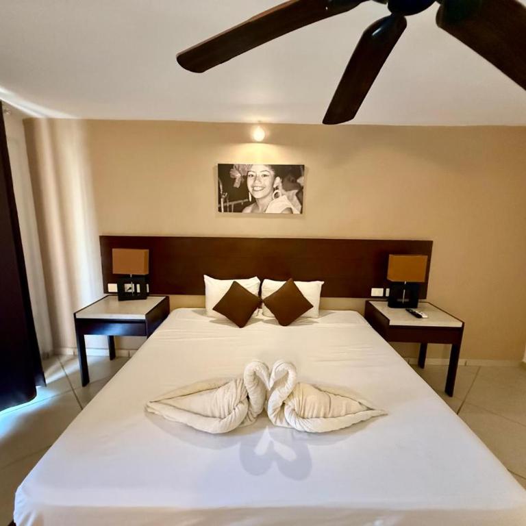 AMANÁA Hotel Boutique - Suite con cama grande y balcón - 16