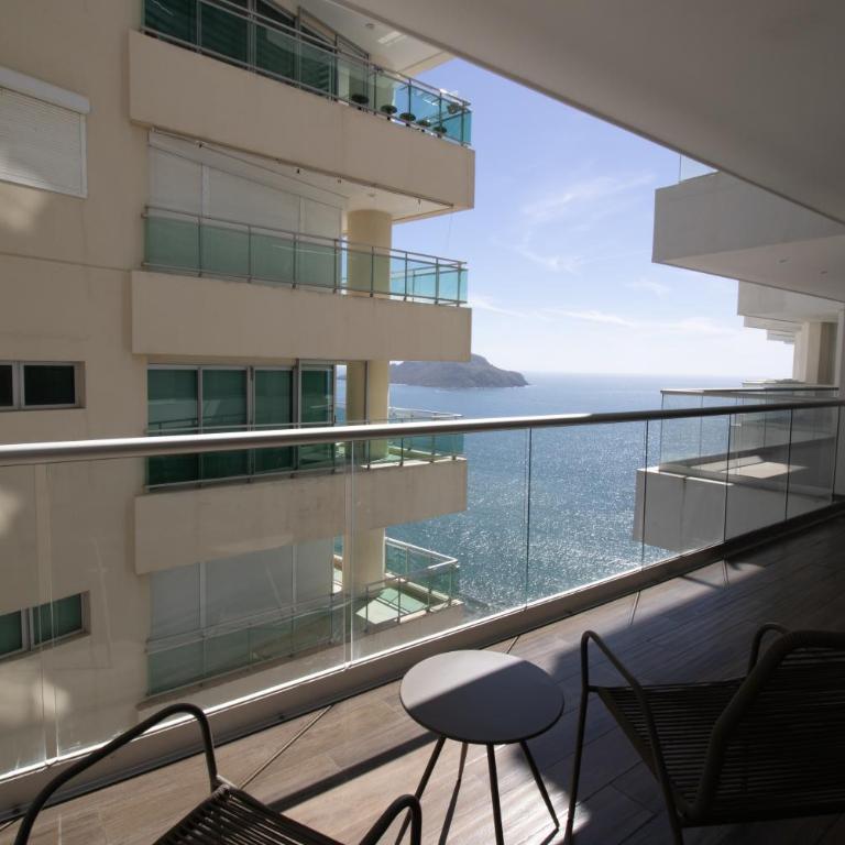 Elegante con vista al mar y balcón by G P S rentas - Two-Bedroom Apartment - 13