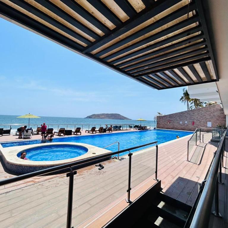 depa vista al atardecer y a pie de playa by G P S rentas - One-Bedroom Apartment - 12