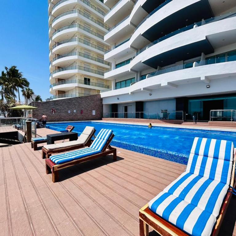 depa vista al atardecer y a pie de playa by G P S rentas - One-Bedroom Apartment - 14