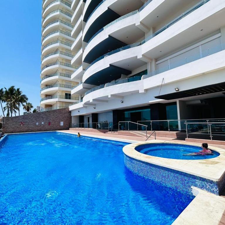 depa vista al atardecer y a pie de playa by G P S rentas - One-Bedroom Apartment - 18