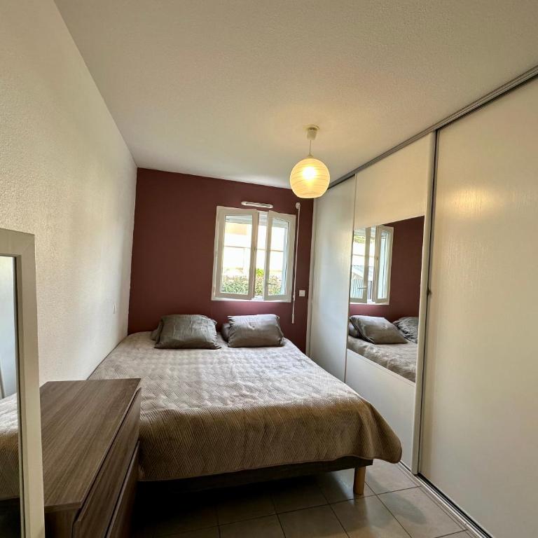 Appartement Cardellina - rez-de-jardin , parking privé - 6 couchages, centre Calvi & plage à pied - Two-Bedroom Apartment - 4