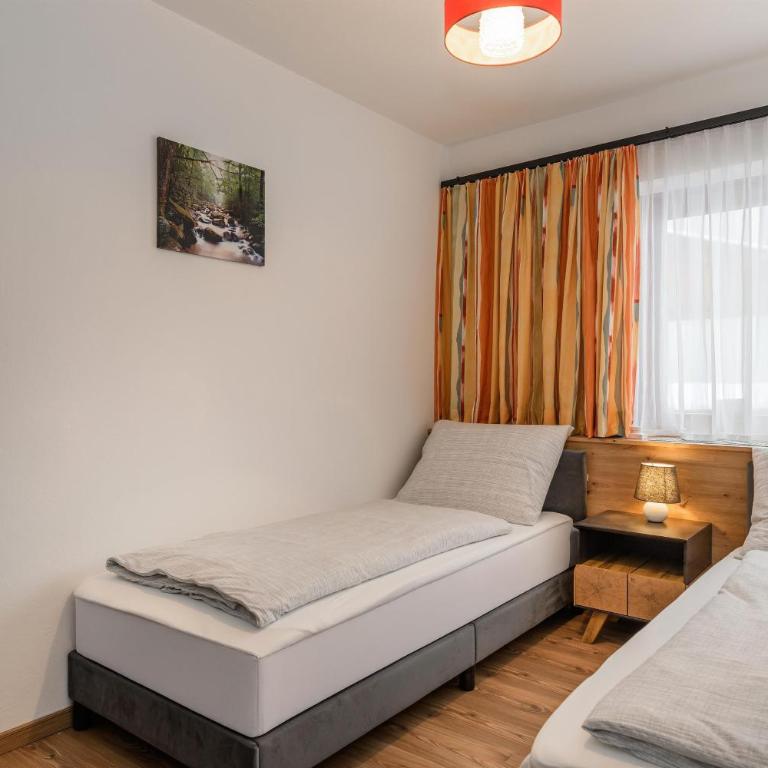 Ferienwohnung Wiesenweg inklusive kostenfreiem Eintritt in die Alpentherme - Apartment mit 2 Schlafzimmern und Dusche - 22