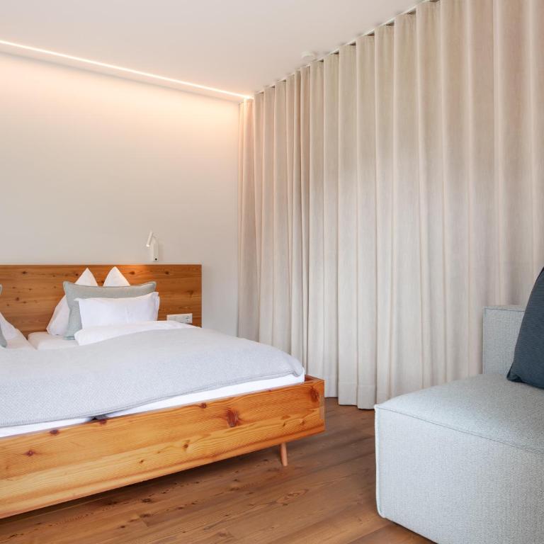Biohotel Gralhof - Doppelzimmer mit Seeblick - 7