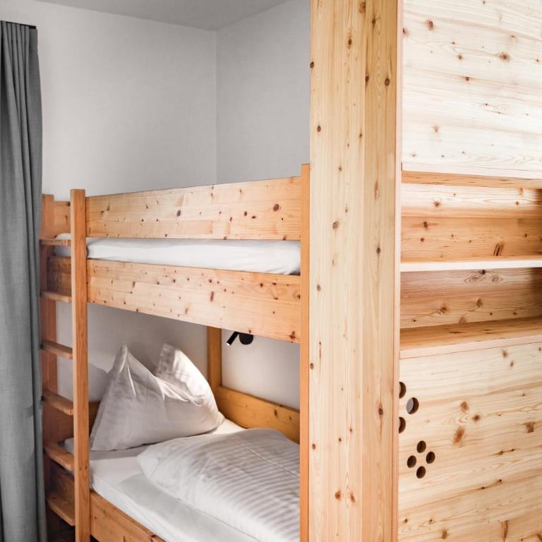 Biohotel Gralhof - Vierbettzimmer mit Seeblick - 10