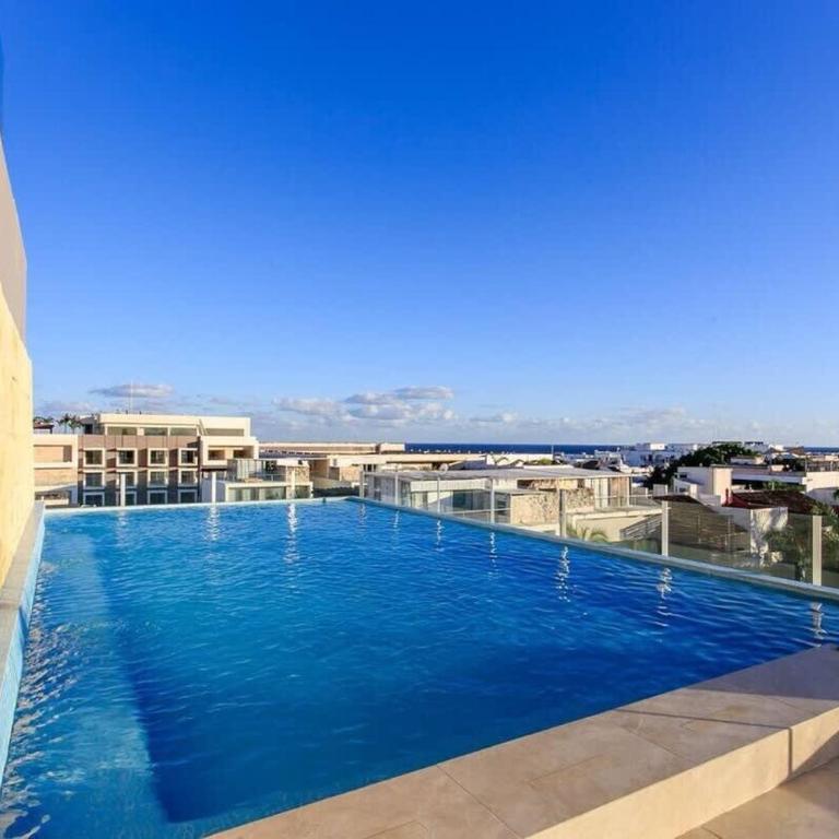 A pasos de la playa | Apartamento elegante en la Quinta Avenida con piscina en la azotea - Apartamento - 5