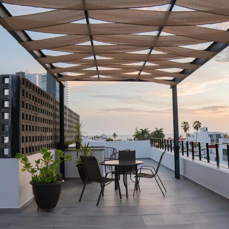 few steps from the beach, at golden zone - Three-Bedroom Apartment - 75