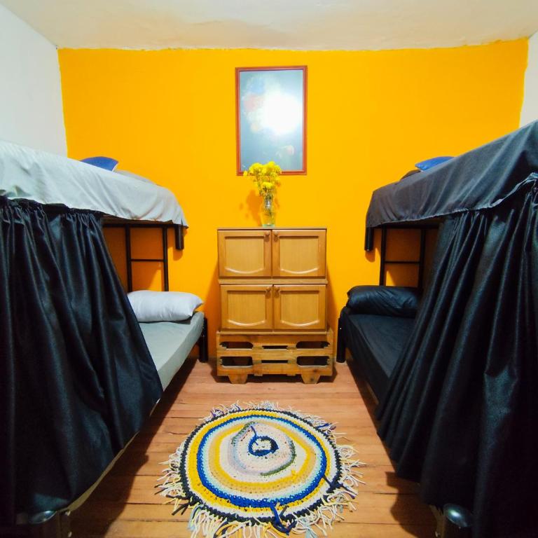Mico Loco Casa Hostal - Cama en habitación compartida con 4 camas - 1