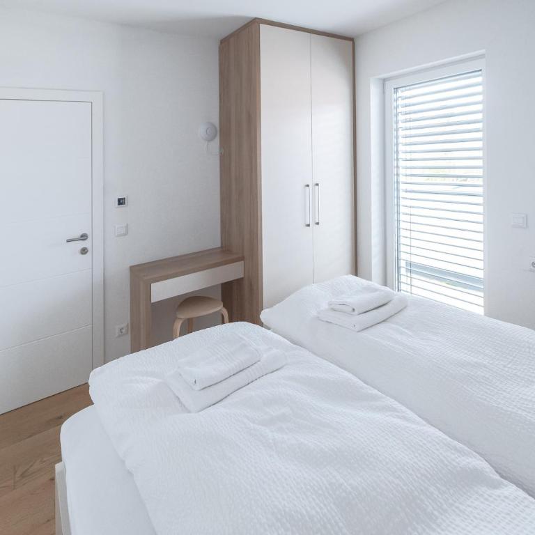Amaria Downtown Aparthotel Villach - Penthouse-Ferienwohnung mit 360-Grad-Terrasse - 15