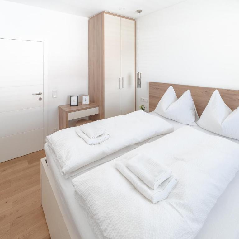 Amaria Downtown Aparthotel Villach - Deluxe Apartment mit Balkon - 12