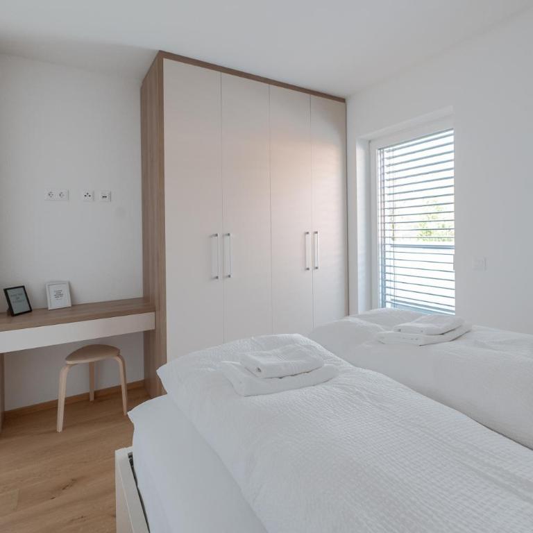 Amaria Downtown Aparthotel Villach - Superior Ferienwohnung mit großer Terrasse - 11
