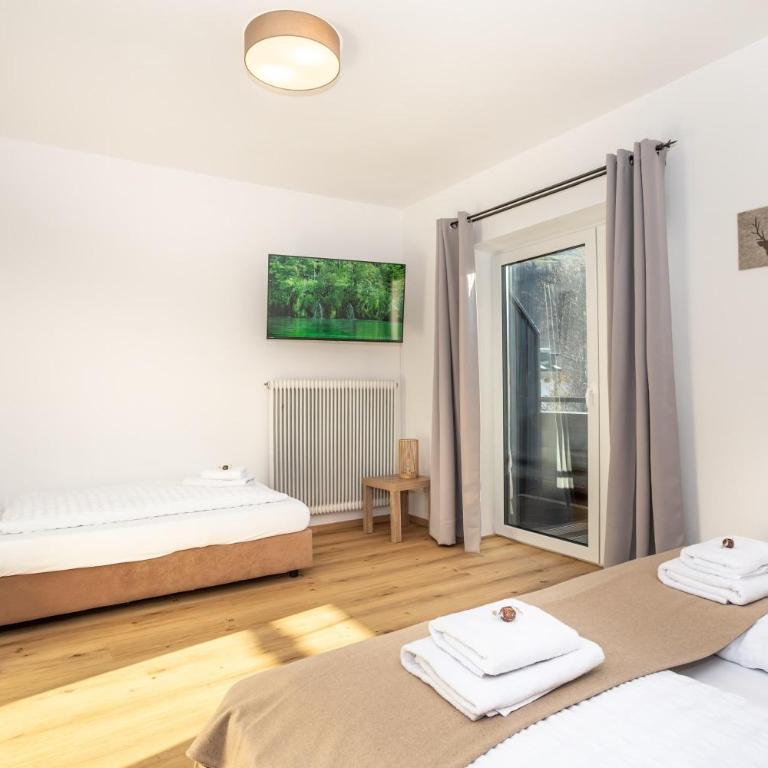 Alpina Apartments - Zell am See - Air Condition - Apartment mit Blick auf die Berge - 16