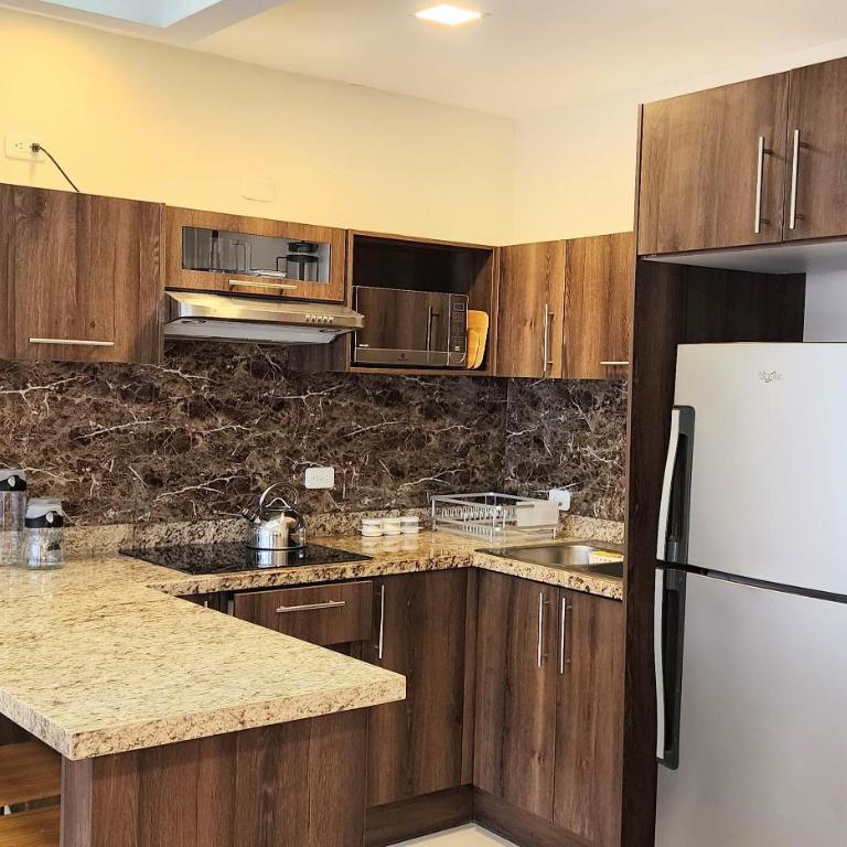 Altamira Apart Suites - Apartamento Deluxe de 2 dormitorios con vistas al jardín - 20