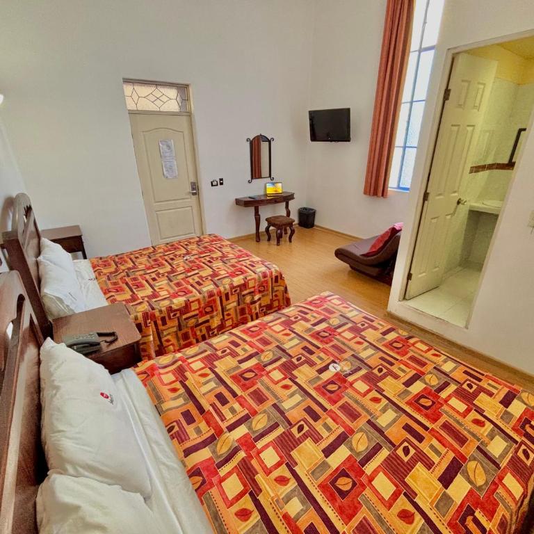 Hotel La Alhondiga - Habitación Doble - 2 camas dobles - 1