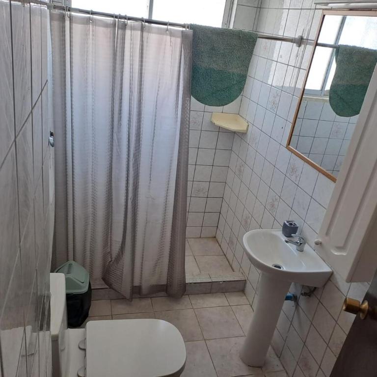 Casa a metros de Playa Principal - Three-Bedroom House - 12