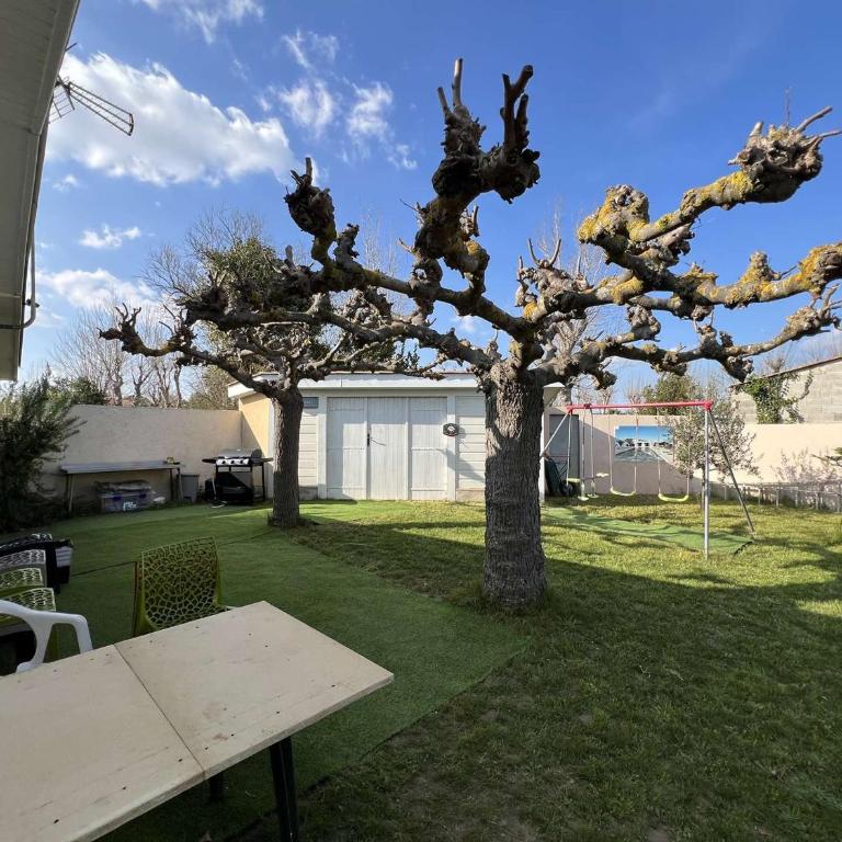 Maison Bungalow Climatisée avec Jardin Arboré, 3 Chambres, Wifi - Proche Plage et Commerces - FR-1-701-84 - Vacation Home - 8