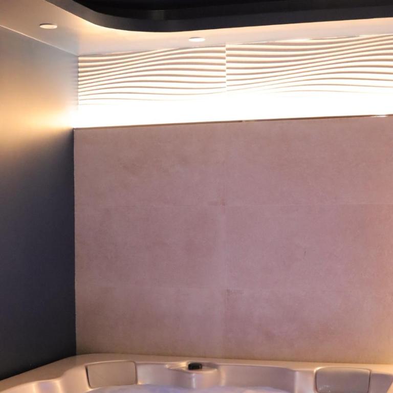 Suite climatisée Jacuzzi privatif Li Li et Rose - Chambre Lit King-Size avec Baignoire Spa - 10