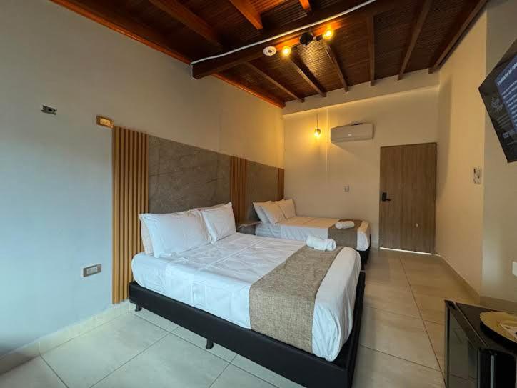 TheLuxe Boutique la 70 Medellin - Habitación Deluxe con 2 camas grandes - 1
