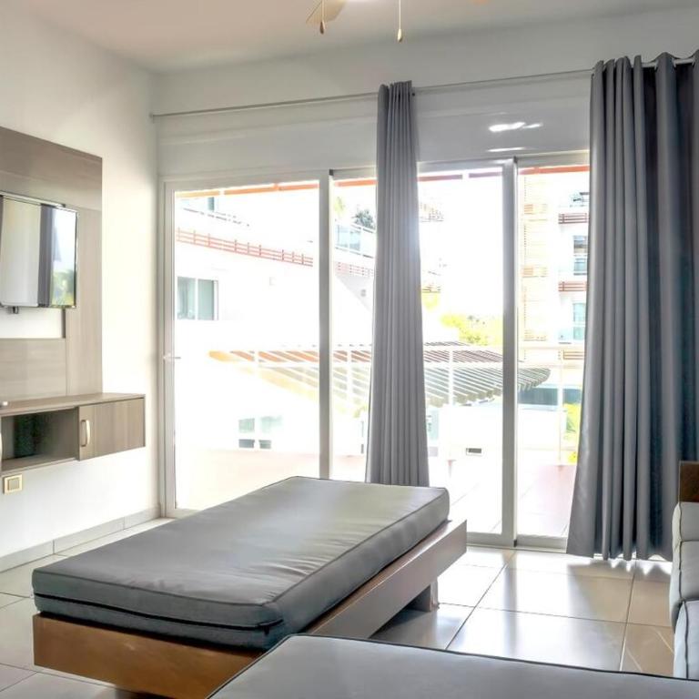 View of the pool and facing the marina - 2009G - Two-Bedroom Apartment - 1