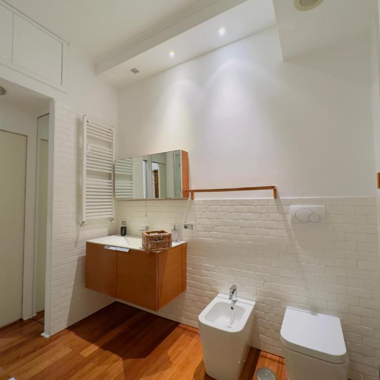 Suite Eroi - Appartamento Familiare con 2 Camere da Letto e Vista - 13