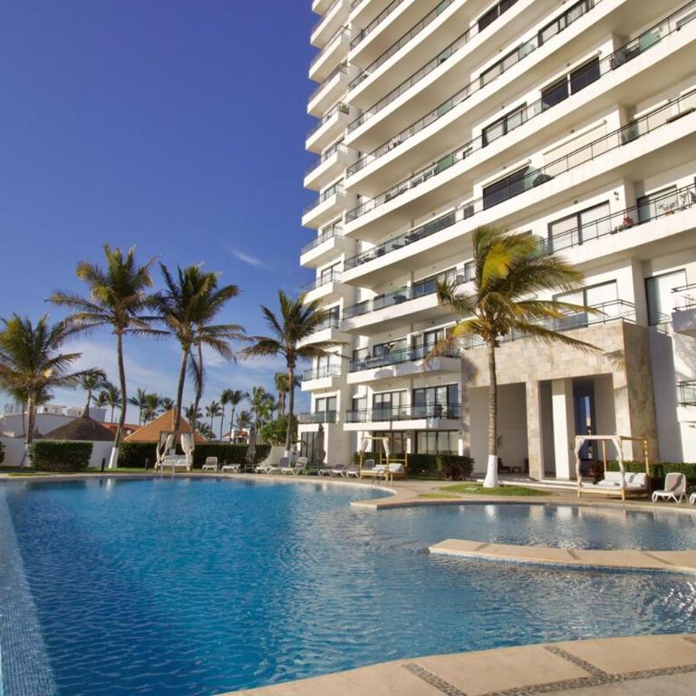 Depa con espectacular vista al mar a pie de playa Torre perla 1102 - Three-Bedroom Apartment - 24