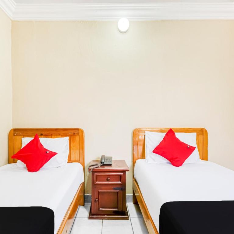 Capital O Colina Dorada - Standard Two Beds - 3