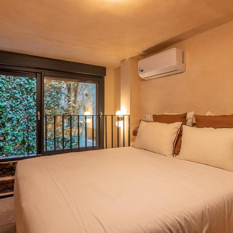 Zarí Apartamentos - Apartamento Deluxe de 2 dormitorios con vistas al jardín - 6