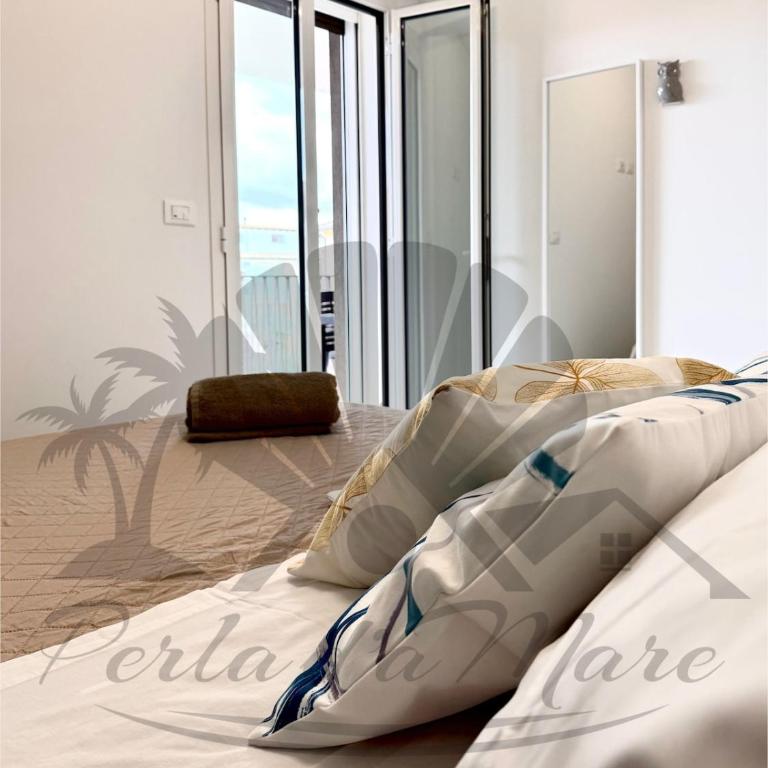Perla d'aMare Corallo - Relax tra mare e natura con spiaggia inclusa e posto auto - One-Bedroom Apartment with Terrace - 11