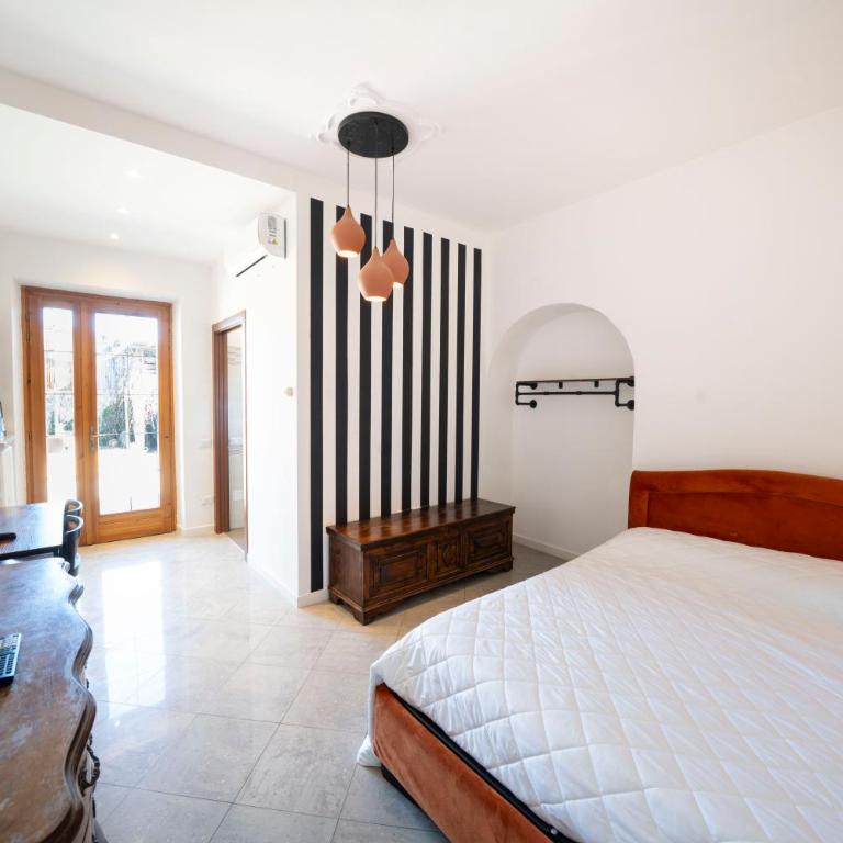 Five Elements Apartments Nature and Relax near Lake Garda - Camera Matrimoniale con Vista Giardino - 1