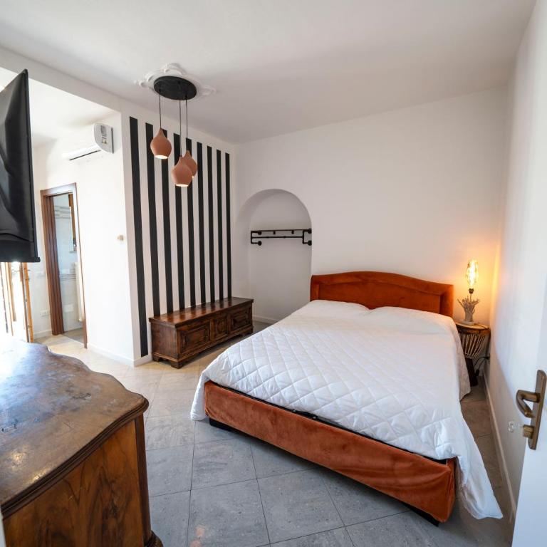 Five Elements Apartments Nature and Relax near Lake Garda - Camera Matrimoniale con Vista Giardino - 9