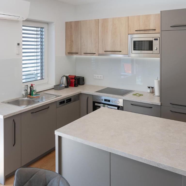 Amaria Downtown Aparthotel Villach - Penthouse-Ferienwohnung mit 360-Grad-Terrasse - 8