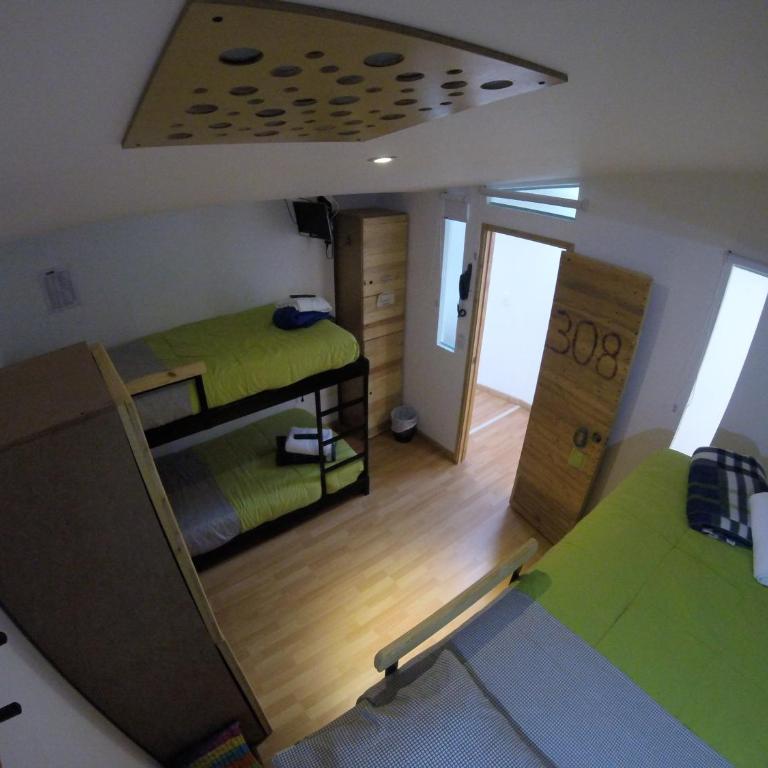 Hostal de la 57 - Cama en habitación compartida con 4 camas - 4