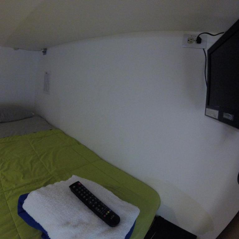 Hostal de la 57 - Cama en habitación compartida con 4 camas - 1