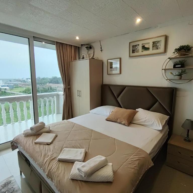 Becic Apartments - Deluks Dvokrevetna soba sa Bračnim Krevetom, Balkonom i Pogledom na More - 7