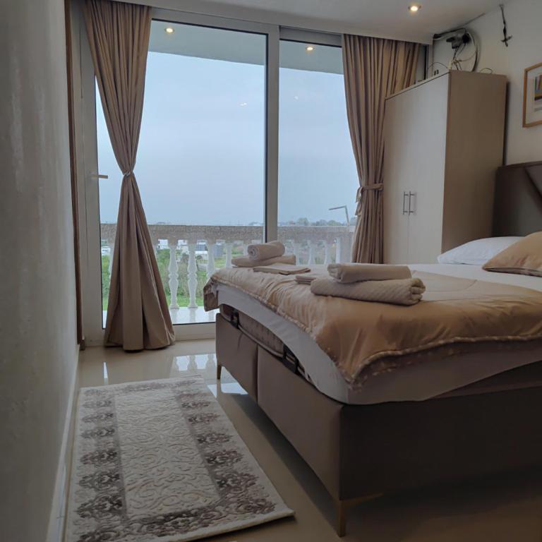 Becic Apartments - Deluks Dvokrevetna soba sa Bračnim Krevetom, Balkonom i Pogledom na More - 8