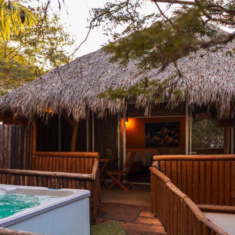Palm Valley Cabins - Deluxe Bungalow with Garden View - 1