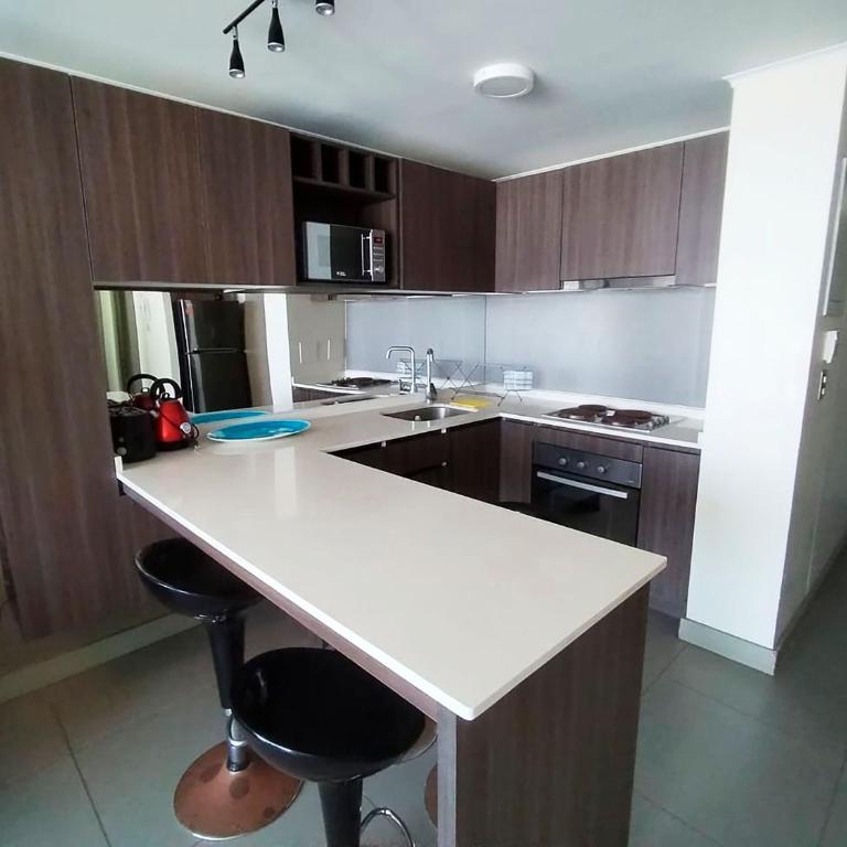 Smart Host Rentals- Tu hogar frente al Mar - Apartamento de 2 dormitorios con terraza y vistas al mar - 18