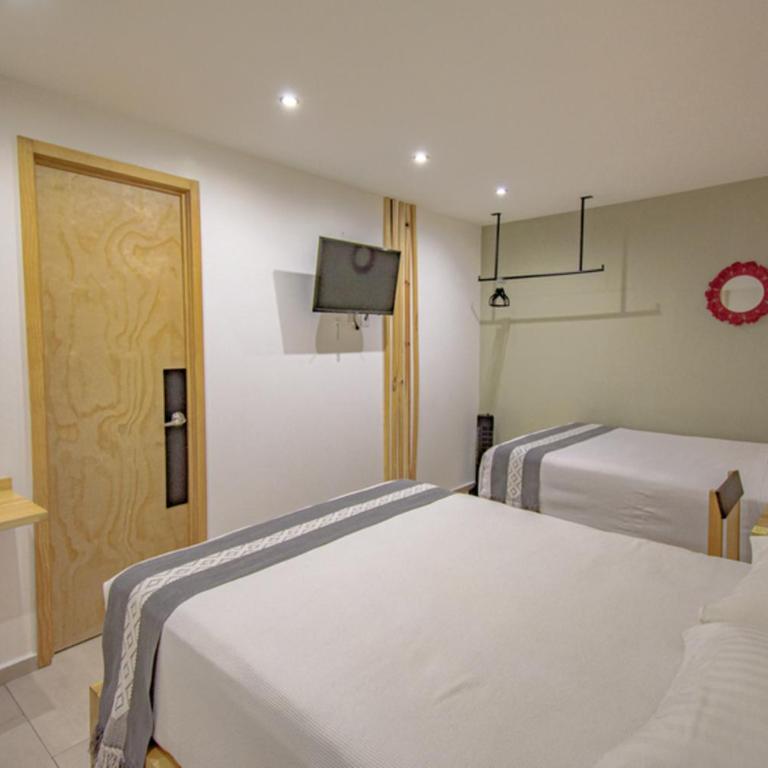 Capital O Hotel Terraza 158 - Standard Two Beds - 16