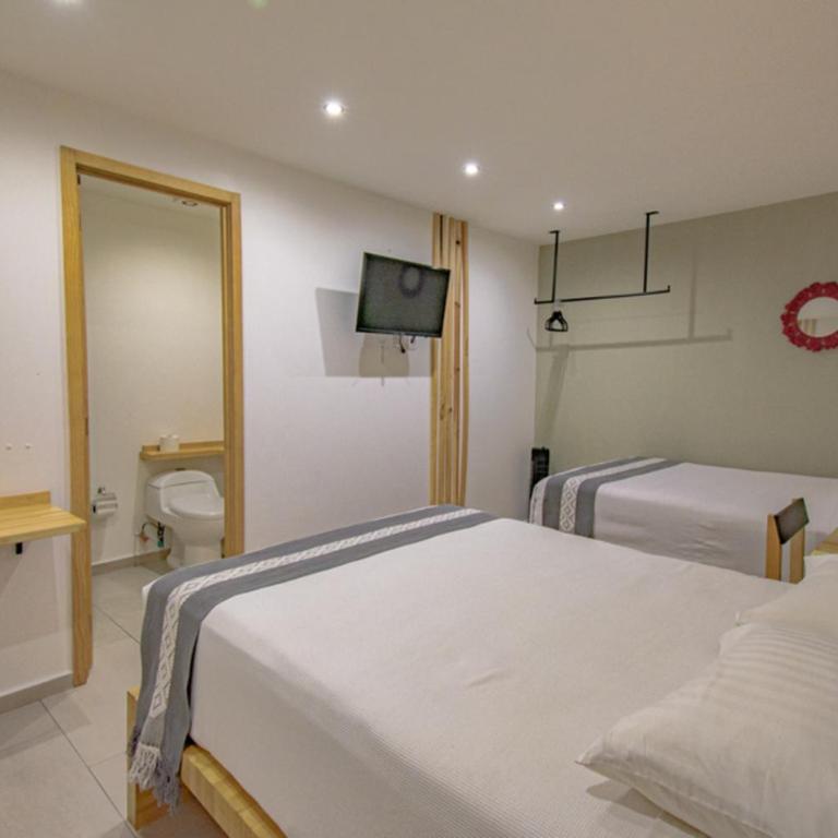 Capital O Hotel Terraza 158 - Standard Two Beds - 14