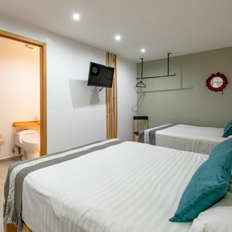 Capital O Hotel Terraza 158 - Standard Two Beds - 1