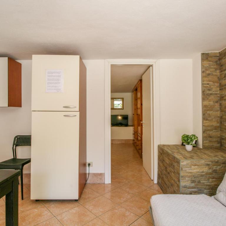 La Tana nel Verde - Comodo Seminterrato - Fiumicino Airport - One-Bedroom Apartment with Garden View - 5