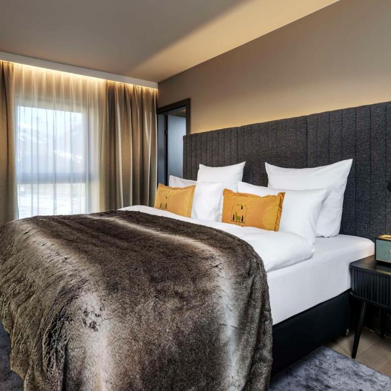 Grand Tirolia Kitzbühel - Member of Hommage Luxury Hotels Collection - Suite mit 1 Schlafzimmer mit Kingsize-Bett und Alpenblick - 5