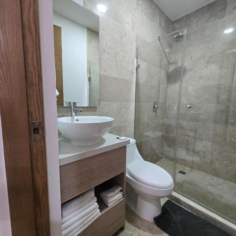 Modern Refuge Just Steps from 5th Avenue - Two-Bedroom Apartment with Balcony and Sea View - 20