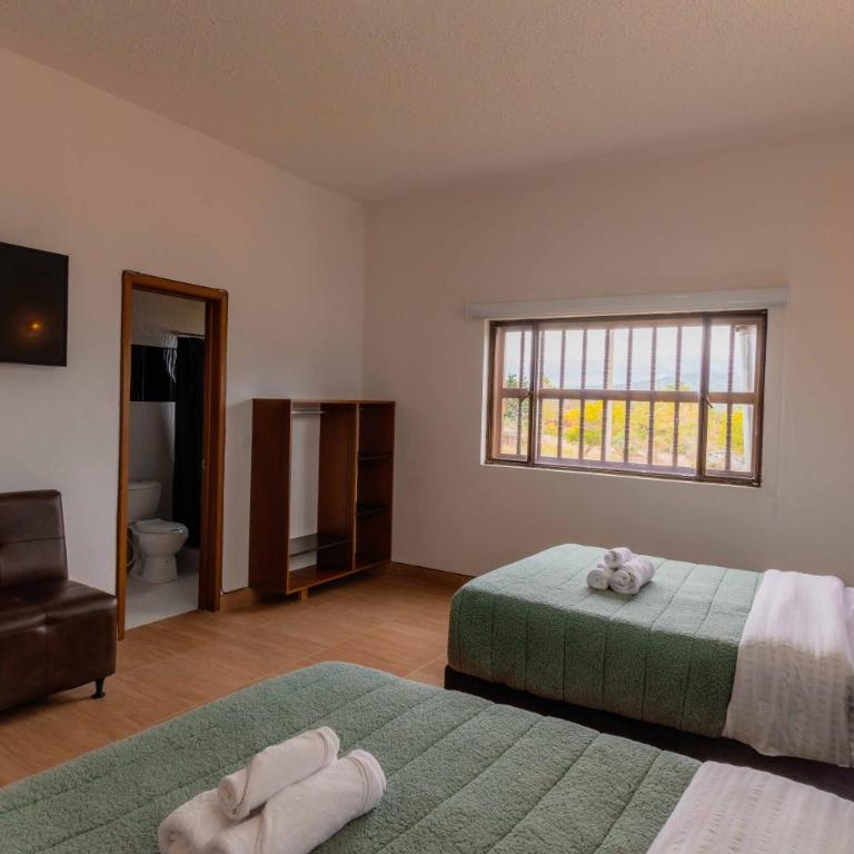 Artemisa Hotel Villa de Leyva - Habitación Doble Estándar con 2 camas dobles - 9