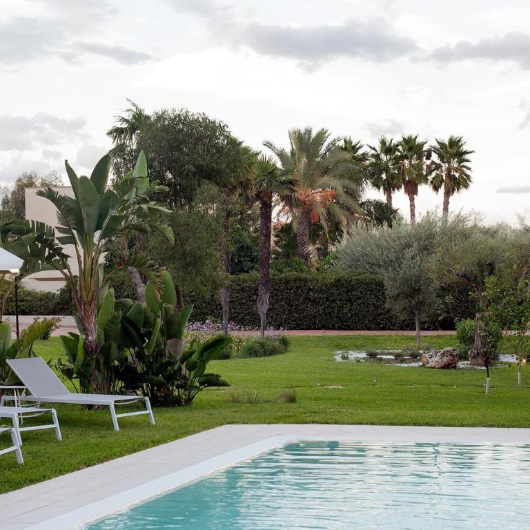 Numeroquattro-Light Green, Open Space con vista sul giardino e piscina - Appartamento con 1 Camera da letto con Vista Parco - 5