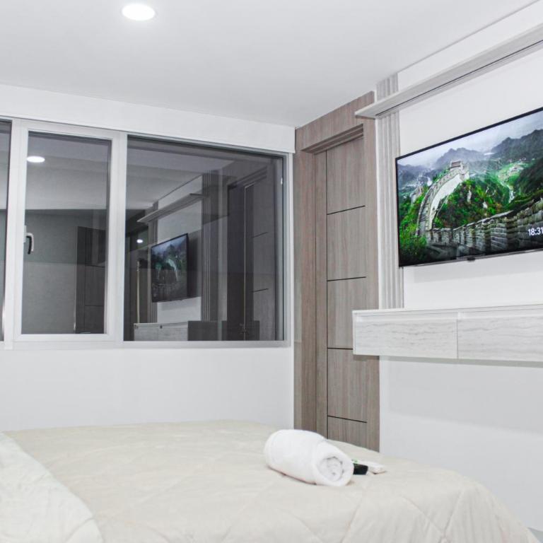 Depa de 3 habitaciones, piso alto, vista a la ciudad, piscina y gym - Apartamento de 1 dormitorio - 64