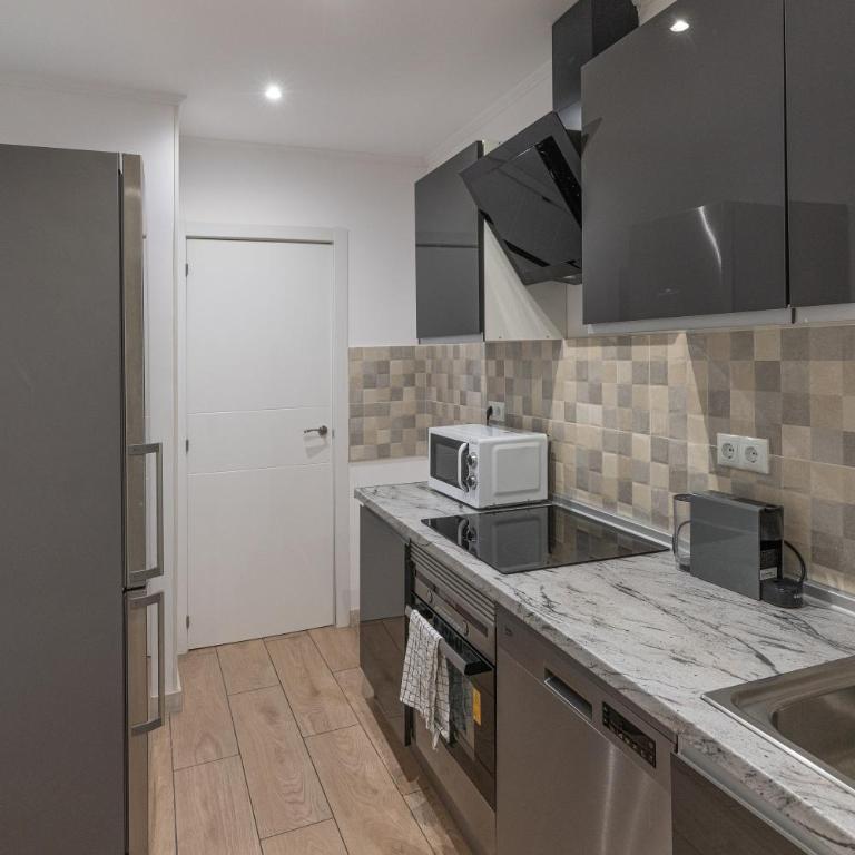 Hermoso apartamento en el centro - Three-Bedroom Apartment - 25