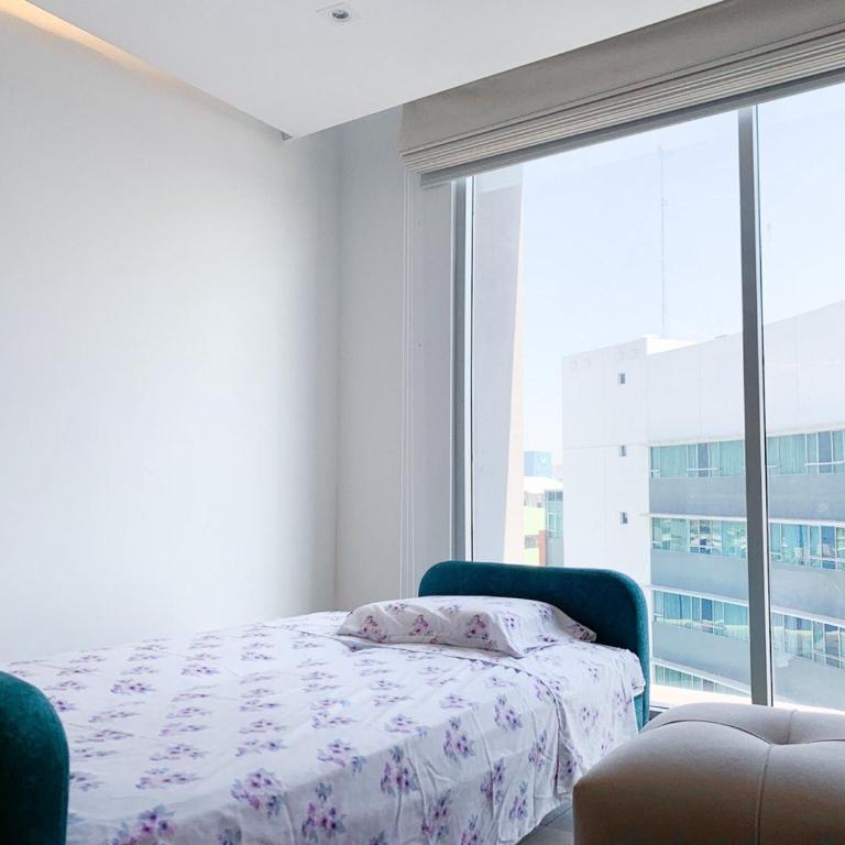 Suite vista a la ciudad, Parqueo, sofa cama, cerca mall del sol - Estudio Deluxe - 7